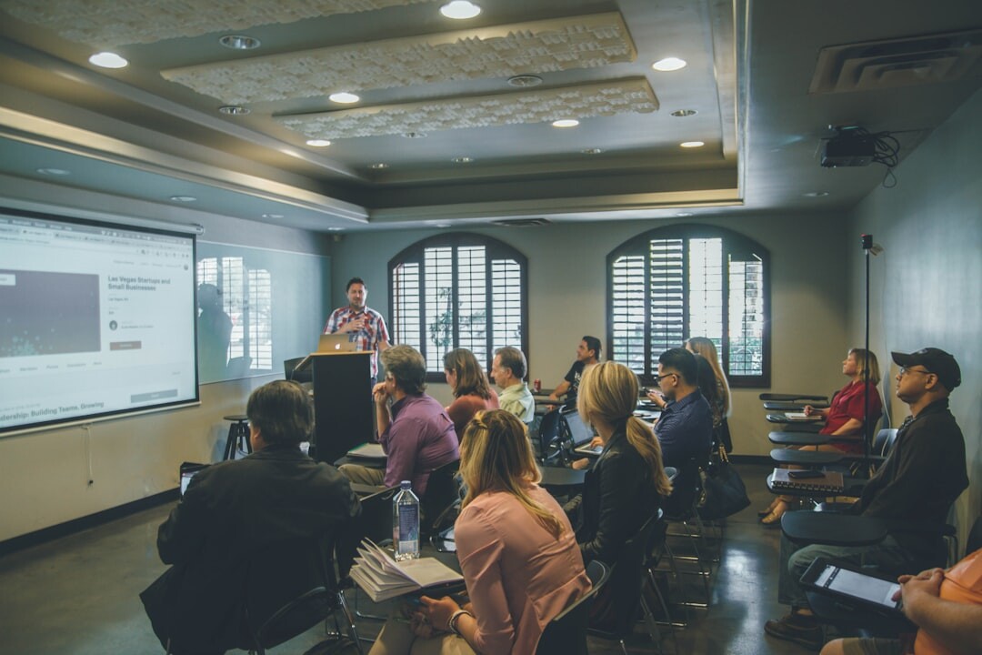 Group of journalism students learning in a workshop