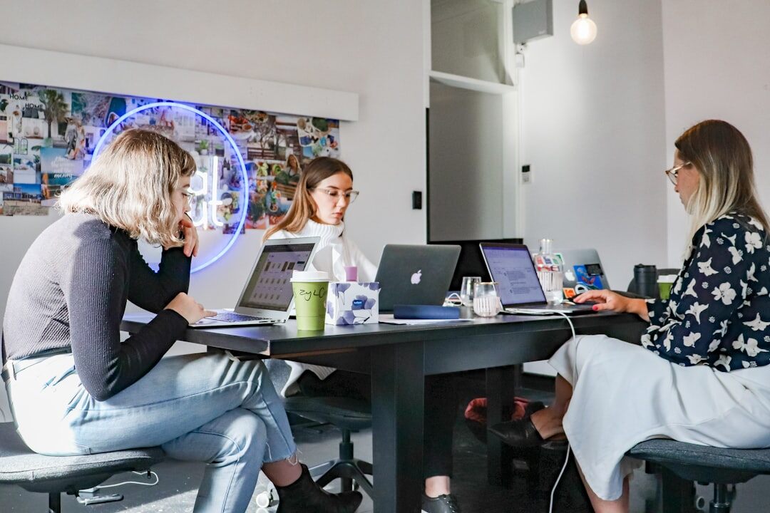 Journalism team working together in a modern newsroom